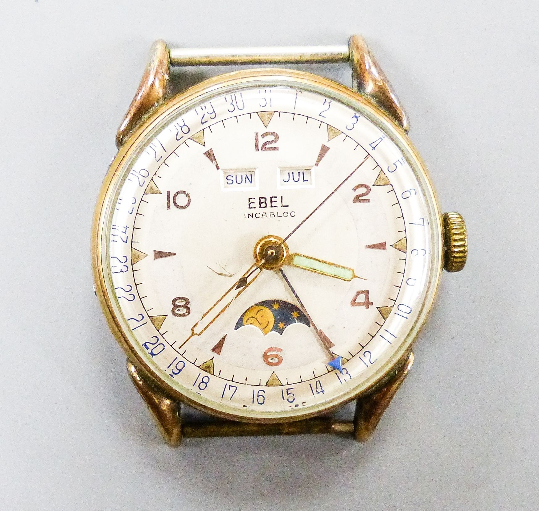 A gentleman's stainless steel and gold plated base metal Ebel calandar manual wind wrist watch (no strap), case diameter 34mm.